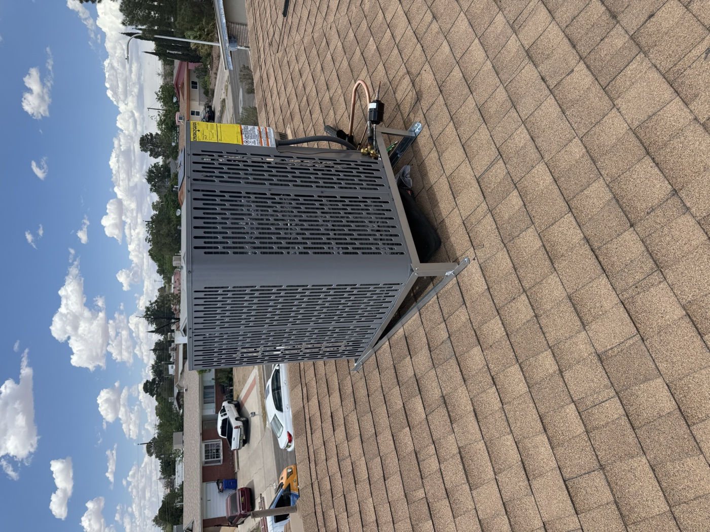 Outdoor AC unit installation on a Las Cruces home