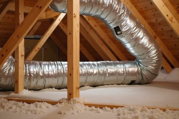 Custom duct installation in attic by sheet metal specialist in Berino NM