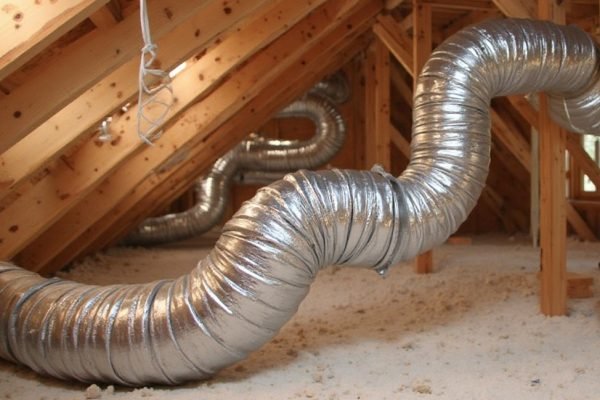 Crew repairing ductwork to restore airflow in a Fairacres, NM home